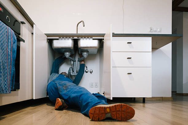 Professional Plumbing technician working in Roslyn Heights, NY